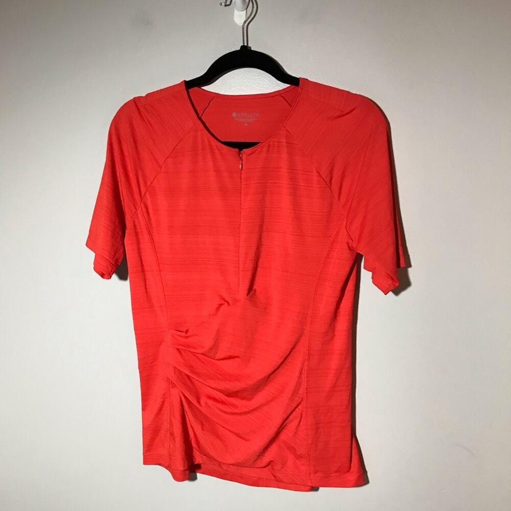 Athleta M orange 1/2 zip short sleeve ruched top back pocket jersey tshirt